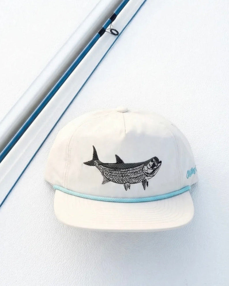 White cap with fish design on a white background