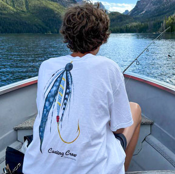 White Casting Crew Jiggin fishing shirt, boat back view